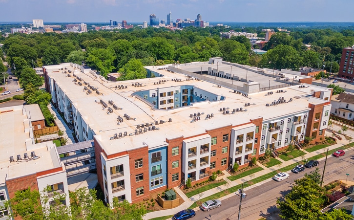 The Edition on Oberlin Raleigh NC Apartment Homes and Townhomes Aerial View of Community with Downtown Skyline